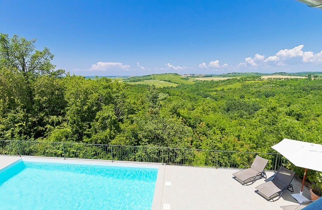 This 4-bedroom villa for up to 8 guests is located in Buje and has a private swimming pool, air-cond