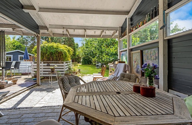 This cozy vacation home welcomes you near the beach in Bjerge Nordstrand.
