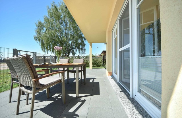 This newly built house is located in the small fishing village of Kamminke, in only