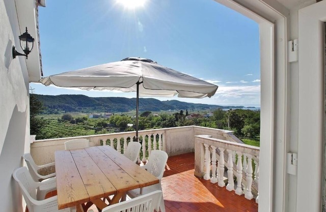Three bedroom apartment with terrace and sea view Rab (A-24682-a)