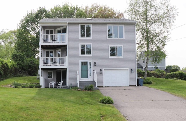 Three level home with water views, walk to beach