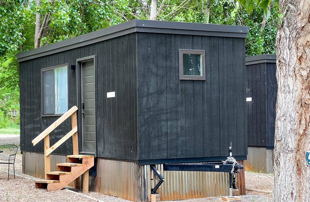 Tiny home with one queen bed and full size futon.