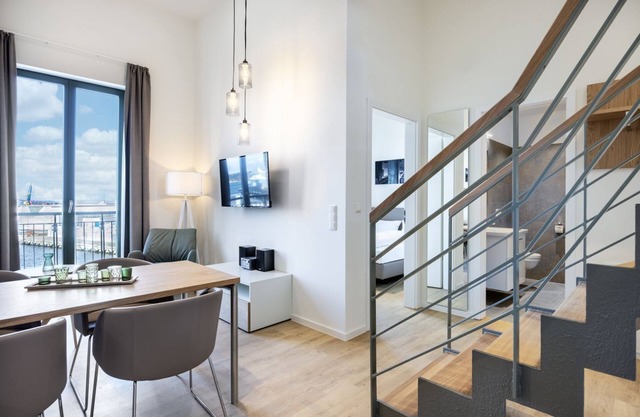 Top apartment with gallery bedroom, roof terrace and unique harbor view