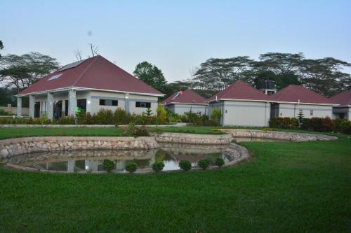 Top Cottages Gardens and Restaurant Kapeeka