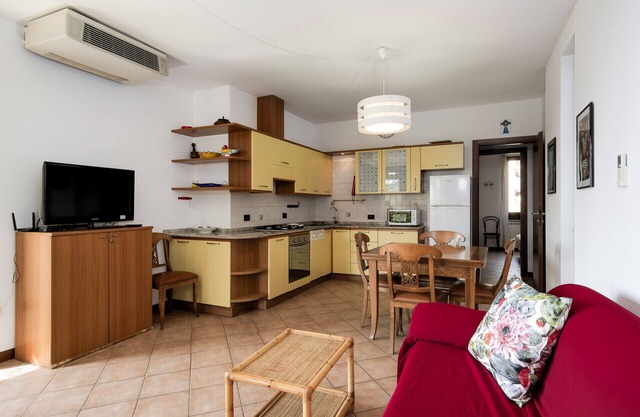 Top location condo with pool, lake view and walk to the beach