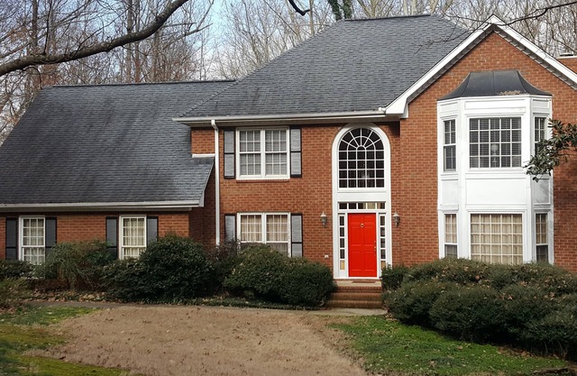 Traditional Home on 2.4 Wooded Acres in swim community.