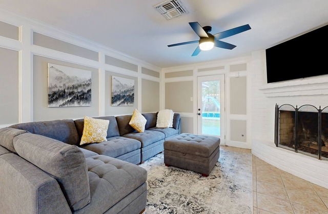 Tree-lined property with pool, bikes, gas fireplace, & separate casita - dogs ok