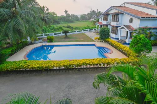 Turquoise 5bhk Villa in Arpora 5mins to Baga