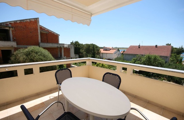 Two bedroom apartment with terrace Novalja, Pag (A-3294-a)