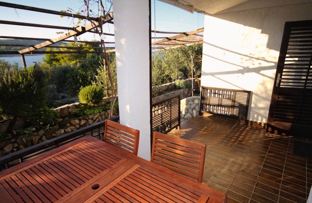Two bedroom apartment with terrace and sea view Cove Pokrivenik, Hvar (A-5224-a)