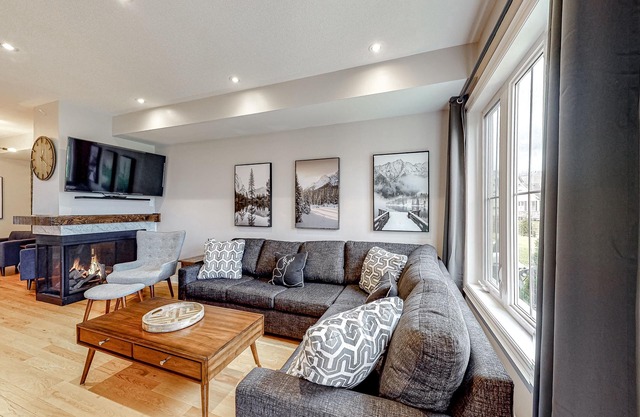 Two-story condo with patio, fireplace, grill, & heated pool - dog-friendly
