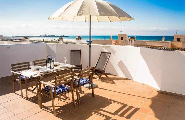 Unique apartment on the beach with terrace and spectacular sea views