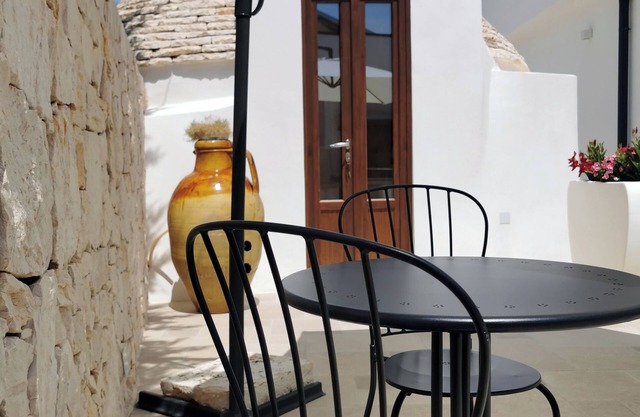 Unique Trullo enchantment among olive trees