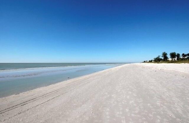 Unmatched Beach View Elegance – Ground-Floor Condo Just Steps from the Sand