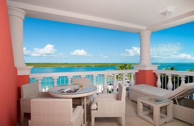 Unwind in Style – TWO Spacious 1BR Oceanfront, Infinity Pool & Water Sports