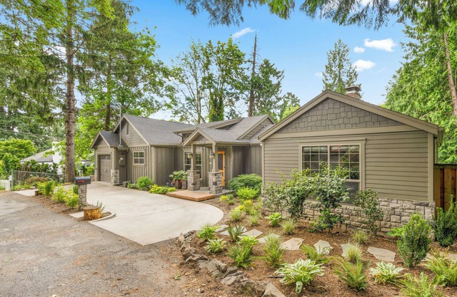 Upscale home in the trees on a hill, yet very close to downtown