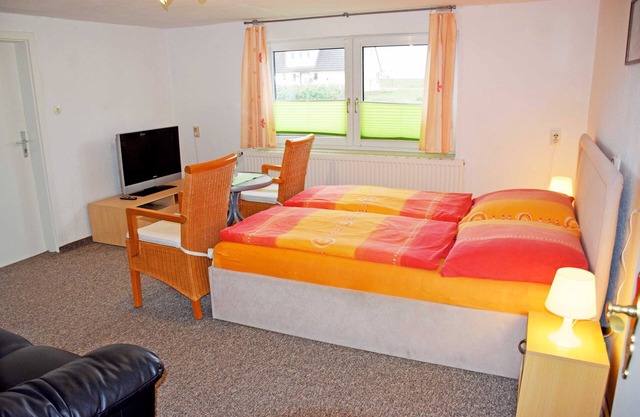 Vacation apartment under thatched roof with terrace Lee - Ferienwohnungen unterm Reetdach