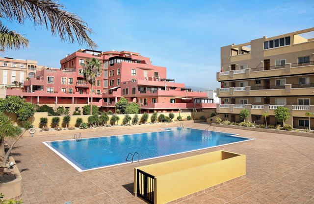 Vacation Apartment 'La Perla F14 En El Médano' with Shared Pool, Balcony and Wi-Fi