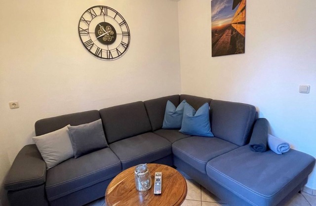 Vacation apartment semi-detached house with 2 bedrooms, garden, balcony and mountain view