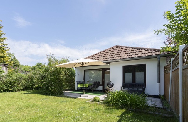 Vacation bungalow with terrace at Zwergenweg 2b in Grömitz-Lensterstrand