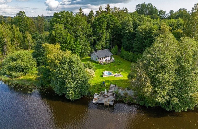 Vacation home on a waterfront property in Alaska-like nature