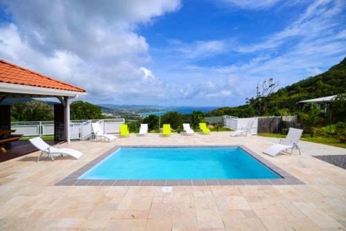 Villa élégante avec piscine privée au Diamant et vue sur la mer