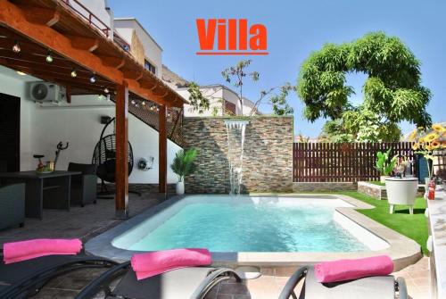 Villa Puerto Rico in front of the shopping center with private heated saltwater pool with jacuzzi & t able fút boll & arcade games OR St andard Villa Puerto Rico in front of the shopping center with private heated saltwater big jacuzzi & arcade games