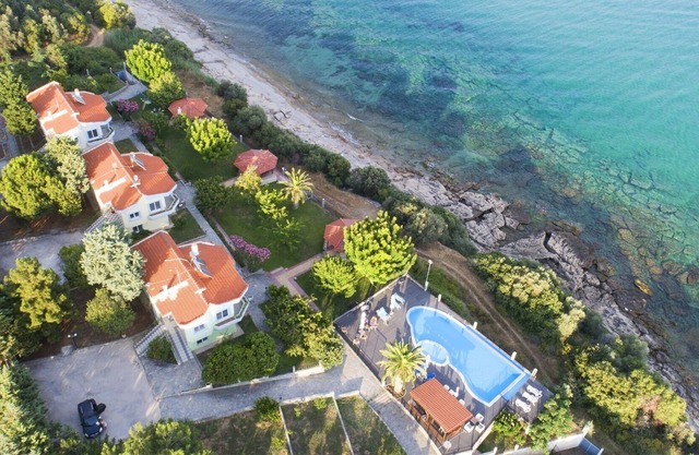 villa infrond of private beach with crystal water outdoor pool with hydromassage