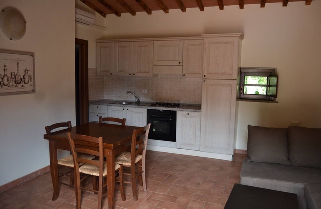Villa in charming stone village with swimming pool, tennis, in the countryside near the sea and services.