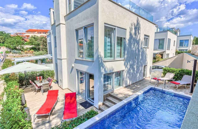 Villa Malinska - three bedroom villa close to beaches with a heated pool