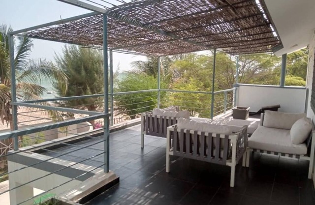 Villa with terrace on first floor and terrace on ground floor overlooking beach