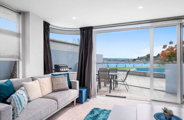 Waimahana Lakefront Apartment - Heated Pool, Hot Tub & Views