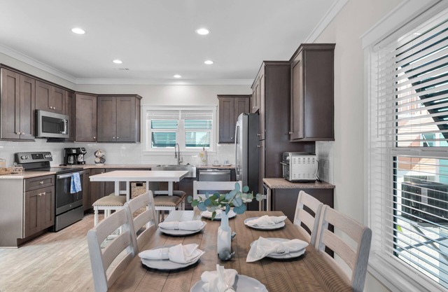 Wake up every day to the sunrise from the deck of this waterfront home 2bed home