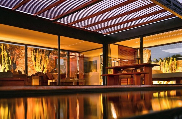 Wake up to nature in this modern glass house
