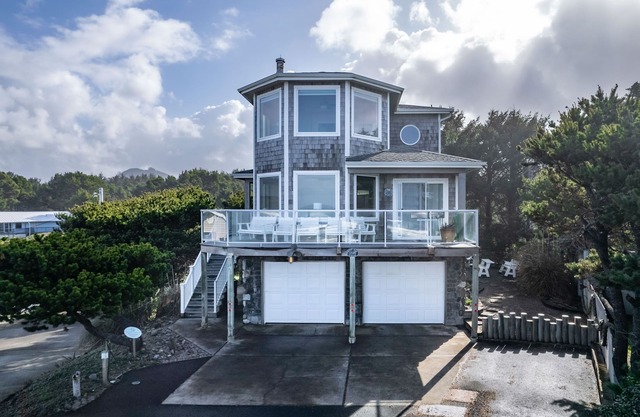 Walk to the sand from this Beachfront Pet Friendly home, enjoy panoramic views