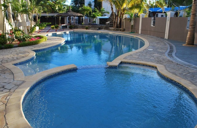 Well located 3 Bedroom Apartment, footsteps away from magnificent beach