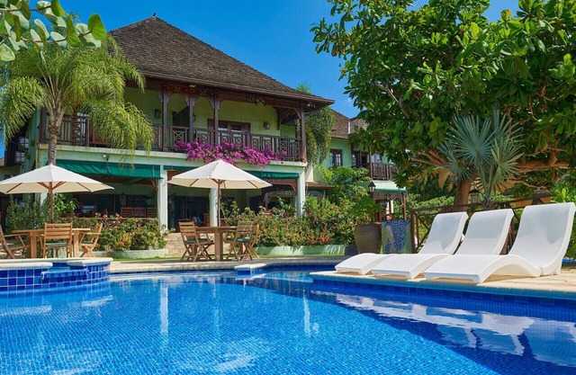 Whispering Waters Villa- Exclusive Beachfront Retreat. Pool, & Spacious Terraces
