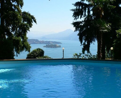 Wonderful apartment in a renowned art nouveau villa with pool and dream view