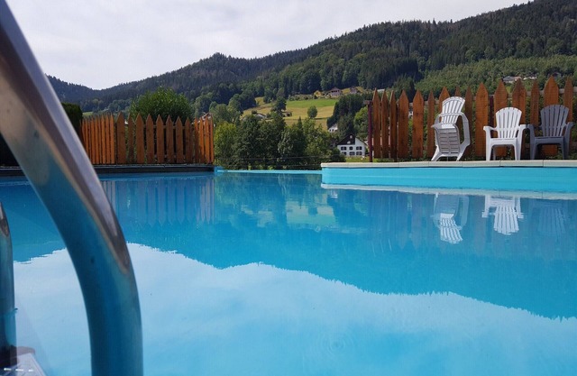 Wooden chalet in Vosges by a pond
