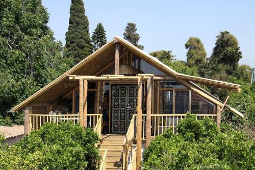 Liman House | ביקתפוז וקלמנטינה- מתחם בקתות וסוויטות עם ג'קוזי פרטי ובריכה משותפת
