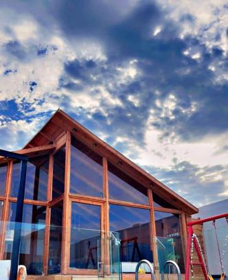 Dhahban Ski Chalet | اكواخ وشاليهات جولدن الفندقية