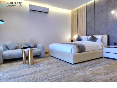 Haql Hotel | فندق وايت سيزون