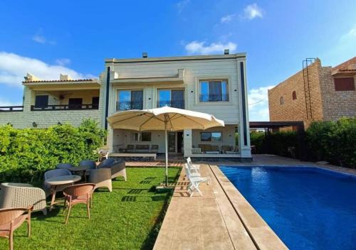 Marina El Alamein Villa | فيلا فاخرة أول صف على البحيرة الرملية