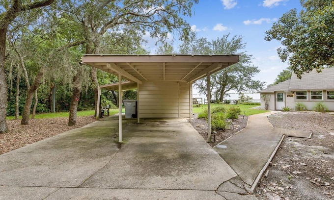 Navarre Cottage | 1 acre Historic Waterfront Cottage, private beach, pet friendly, 3 miles to Gulf