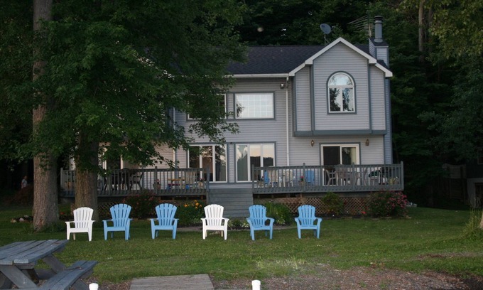 Moravia House | 1 acre of level property, 339' of private waterfront and easy beach level access
