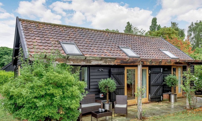 Stoke Holy Cross Cabin | 1 bedroom accommodation in Dunston, near Norwich