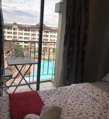 Poblacion District Apartment | 1 Bedroom unit with balcony and facing amenities and just beside SM Ecoland