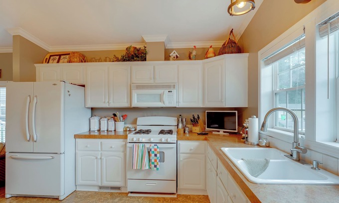 Mears Cottage | 1 Mi to Silver Lake Sand Dunes: Family Gem w/Yard