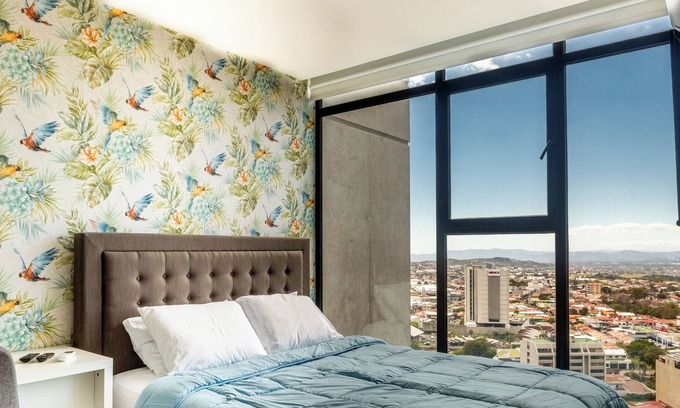 Rohrmoser Apartment | 19th floor, Luxe & Tropical with spectacular view