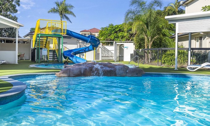 Mermaid Beach Apartment | 2-Bed Family Haven with Pools, BBQ & Playgrounds